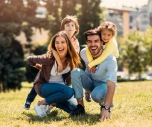 This is a photo of a family in a park.